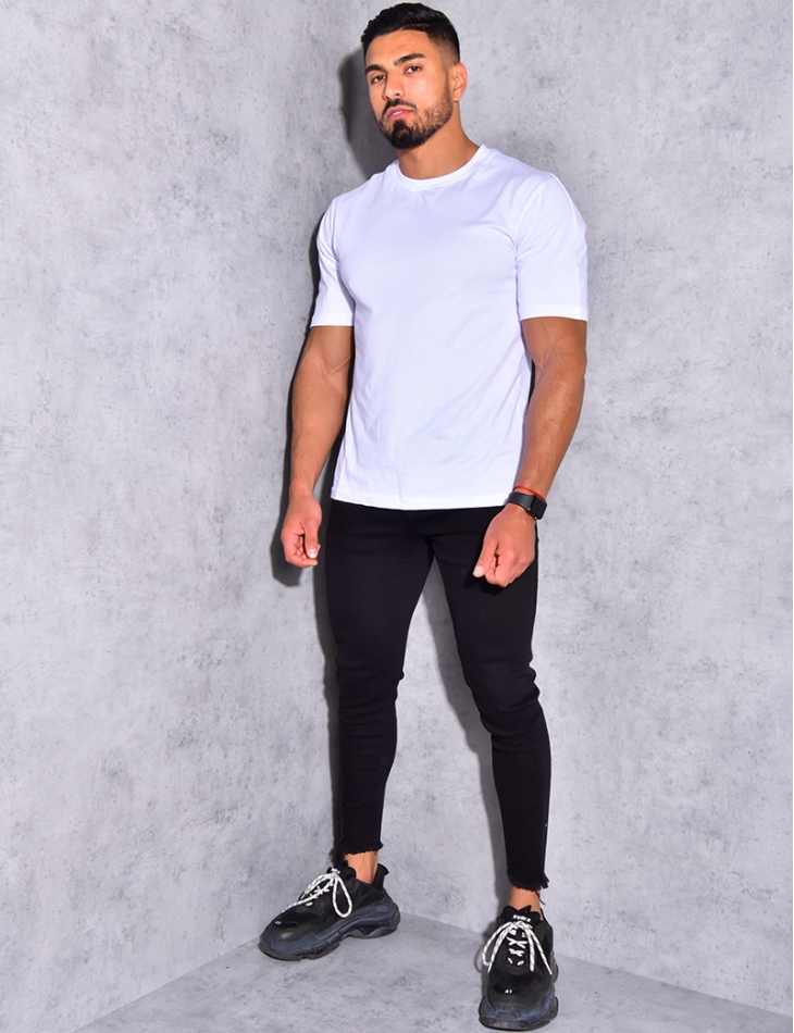 Jeans basic effiloché aux chevilles Jeans basic effiloché aux chevilles