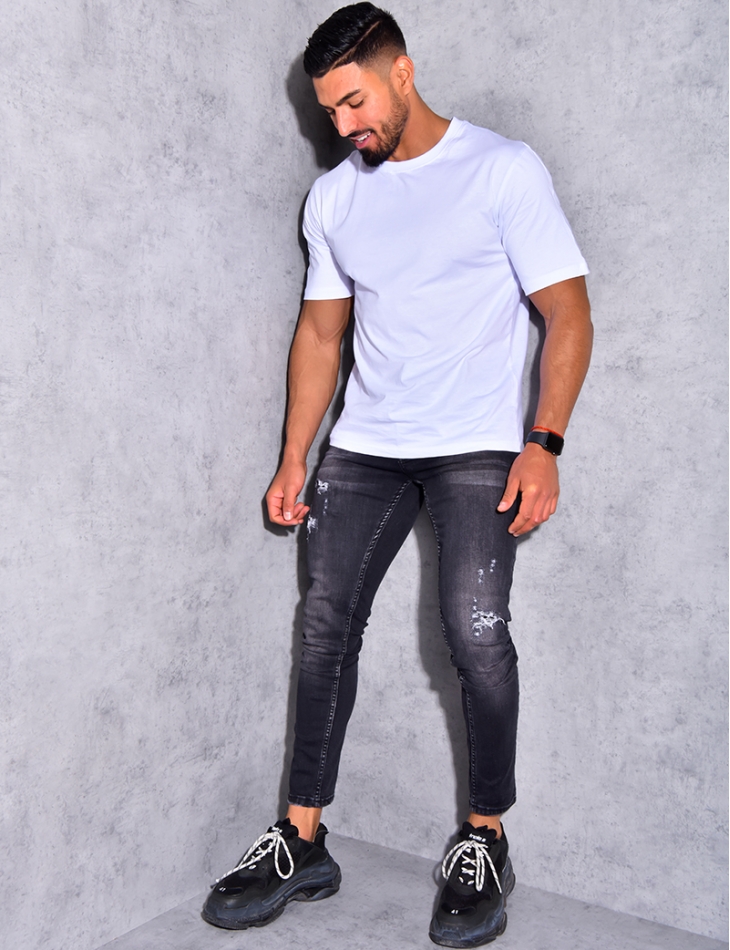 Jeans destroy à ficelle Jeans destroy à ficelle
