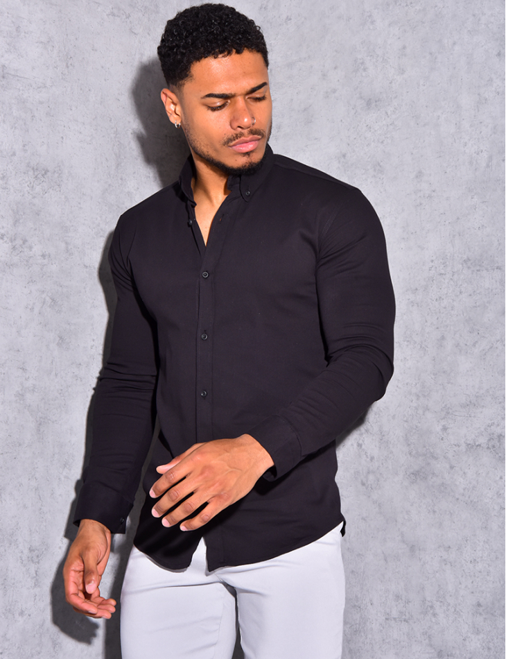 Chemise légére avec bouton sur le col Chemise légére avec bouton sur le col