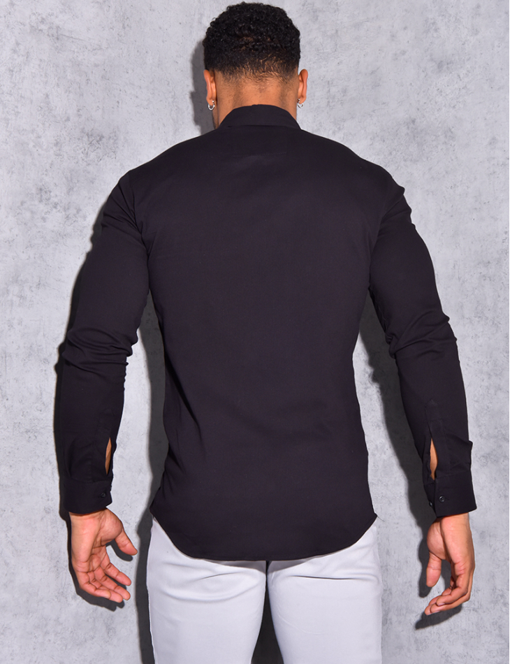 Chemise légére avec bouton sur le col Chemise légére avec bouton sur le col