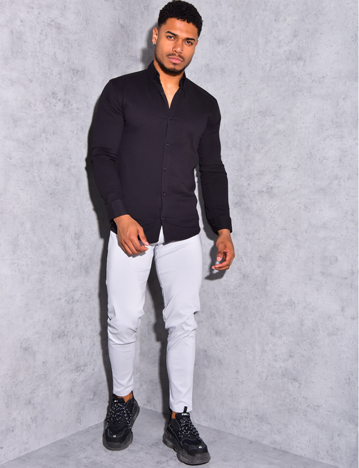 Chemise légére avec bouton sur le col Chemise légére avec bouton sur le col