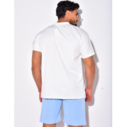 T-shirt à poches avec boutons dorés