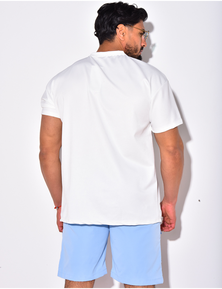 T-shirt à poches avec boutons dorés