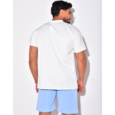 T-shirt à poches avec boutons dorés