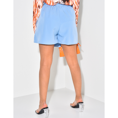 Jupe short à boutons perlés Jupe short à boutons perlés