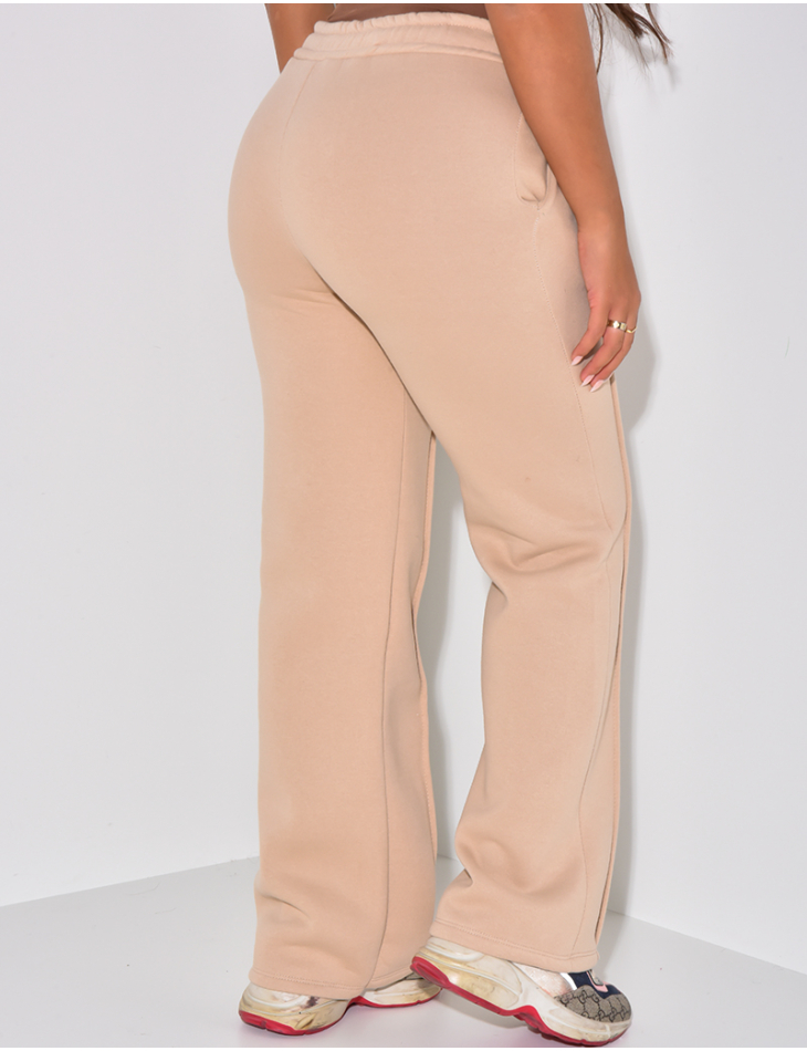 Fleece-Jogginghose mit Streifen. Fleece-Jogginghose mit Streifen.