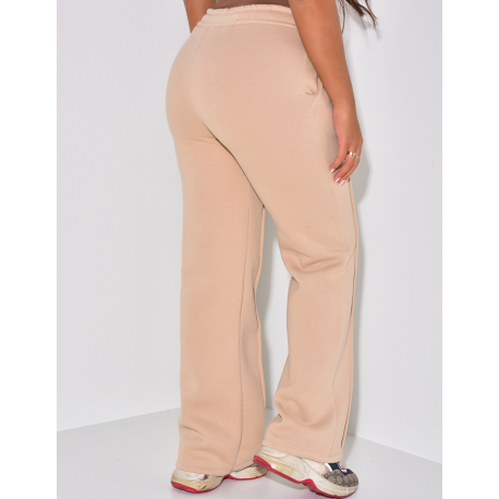 Fleece-Jogginghose mit Streifen. Fleece-Jogginghose mit Streifen.