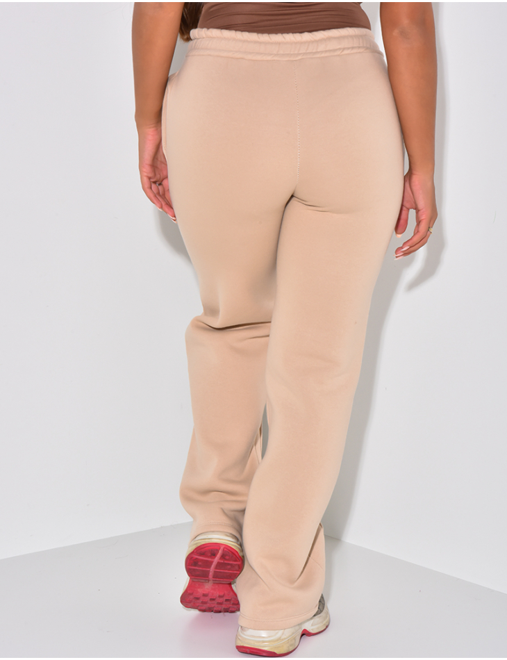 Fleece-Jogginghose mit Streifen. Fleece-Jogginghose mit Streifen.