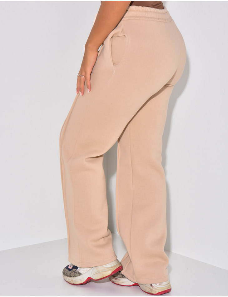 Fleece-Jogginghose mit Streifen. Fleece-Jogginghose mit Streifen.