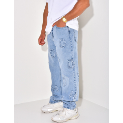 Jeans coupe large avec lettres en relief Jeans coupe large avec lettres en relief