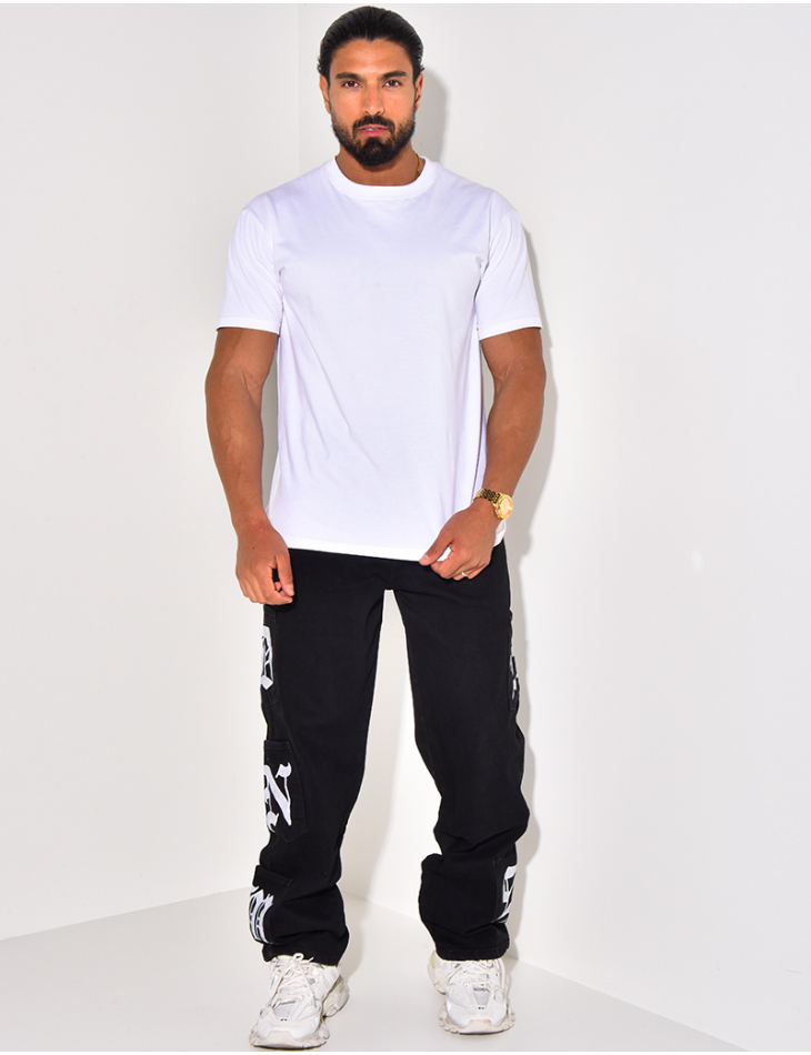 Jeans à poches et écritures