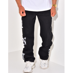 Jeans à poches et écritures