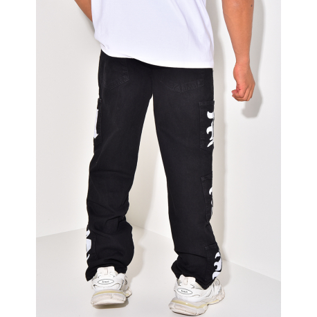 Jeans à poches et écritures