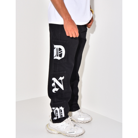 Jeans à poches et écritures