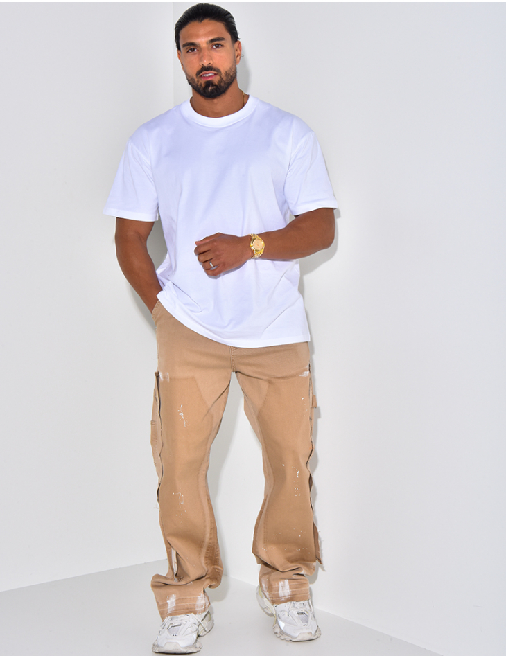 Jeans effet déchiré à tâches de peinture Jeans effet déchiré à tâches de peinture