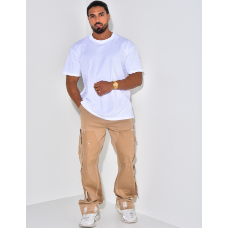 Jeans effet déchiré à tâches de peinture Jeans effet déchiré à tâches de peinture