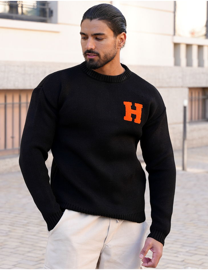 Pull épais avec la lettre H