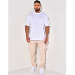 Pantalon à poches et fermeture éclaire aux chevilles Pantalon à poches et fermeture éclaire aux chevilles