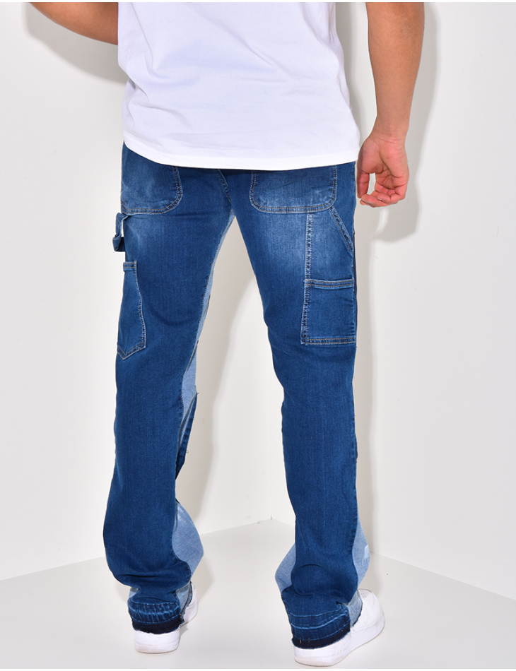 Jeans à poches avec empiècements et tâches de peinture Jeans à poches avec empiècements et tâches de peinture