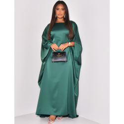 Oversize-Kleid aus Satin, das an der Taille eng anliegt. Oversize-Kleid aus Satin, das an der Taille eng anliegt.