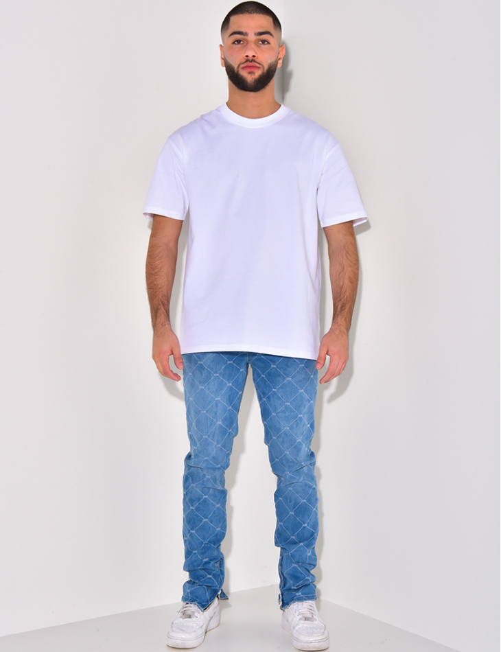 Jeans à motifs losange et zip aux chevilles Jeans à motifs losange et zip aux chevilles