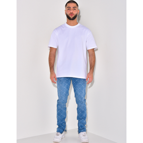 Jeans à motifs losange et zip aux chevilles Jeans à motifs losange et zip aux chevilles