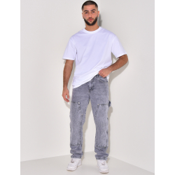 Jeans avec empiècements à motifs en relief