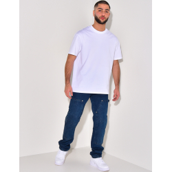 Jeans avec empiècements à motifs en relief Jeans avec empiècements à motifs en relief