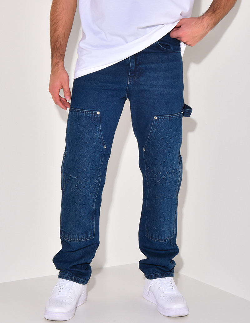 Jeans avec empiècements à motifs en relief