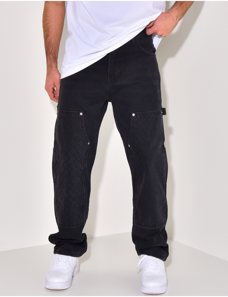 Jeans avec empiècements à motifs en relief