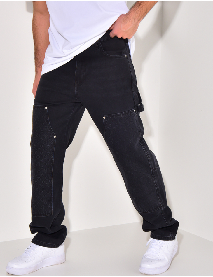 Jeans avec empiècements à motifs en relief