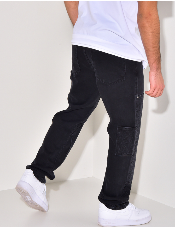 Jeans avec empiècements à motifs en relief