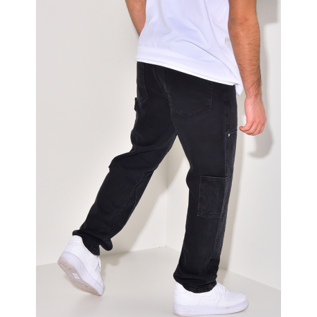 Jeans avec empiècements à motifs en relief