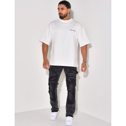 Jeans à empiècements et tâches de peinture Jeans à empiècements et tâches de peinture