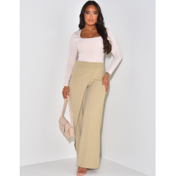 Tailored trousers with asymmetric yoke Tailored trousers with asymmetric yoke
