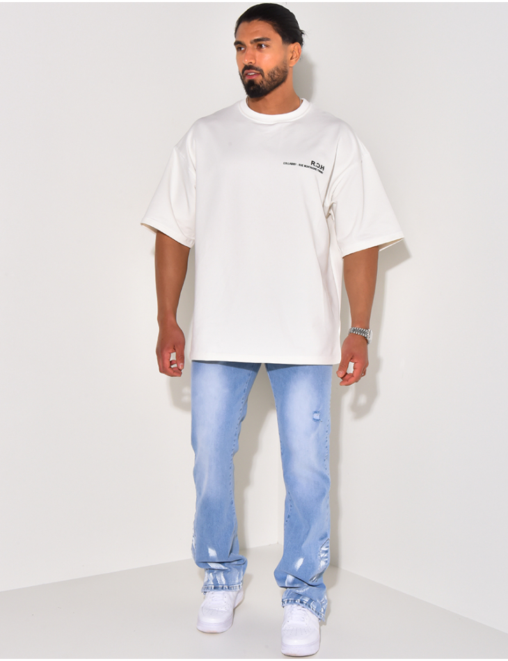 Jeans destroy à tâches de peinture Jeans destroy à tâches de peinture