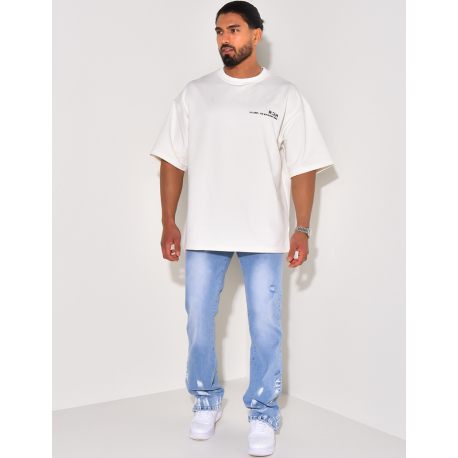 Jeans destroy à tâches de peinture Jeans destroy à tâches de peinture