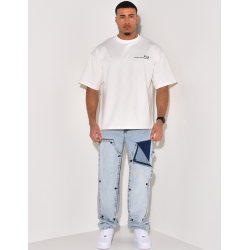 Jeans mit Druckknopfeinsätzen Jeans mit Druckknopfeinsätzen