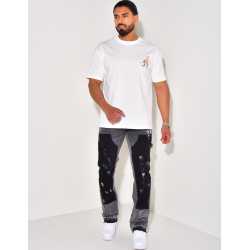 Jeans with panels and stains