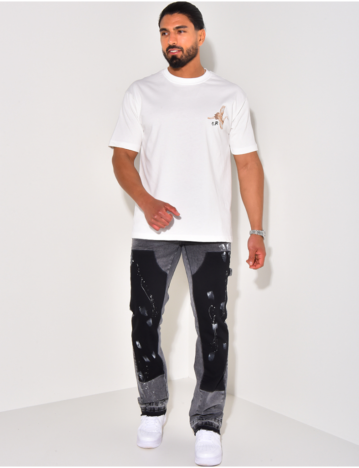Jeans with panels and stains