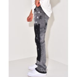 Jeans with panels and stains