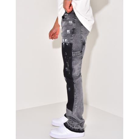 Jeans with panels and stains