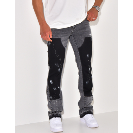 Jeans with panels and stains