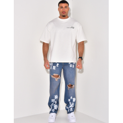 Zerstörte Jeans mit Schriftzug Zerstörte Jeans mit Schriftzug