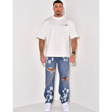 Zerstörte Jeans mit Schriftzug Zerstörte Jeans mit Schriftzug
