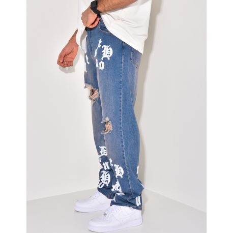 Zerstörte Jeans mit Schriftzug Zerstörte Jeans mit Schriftzug