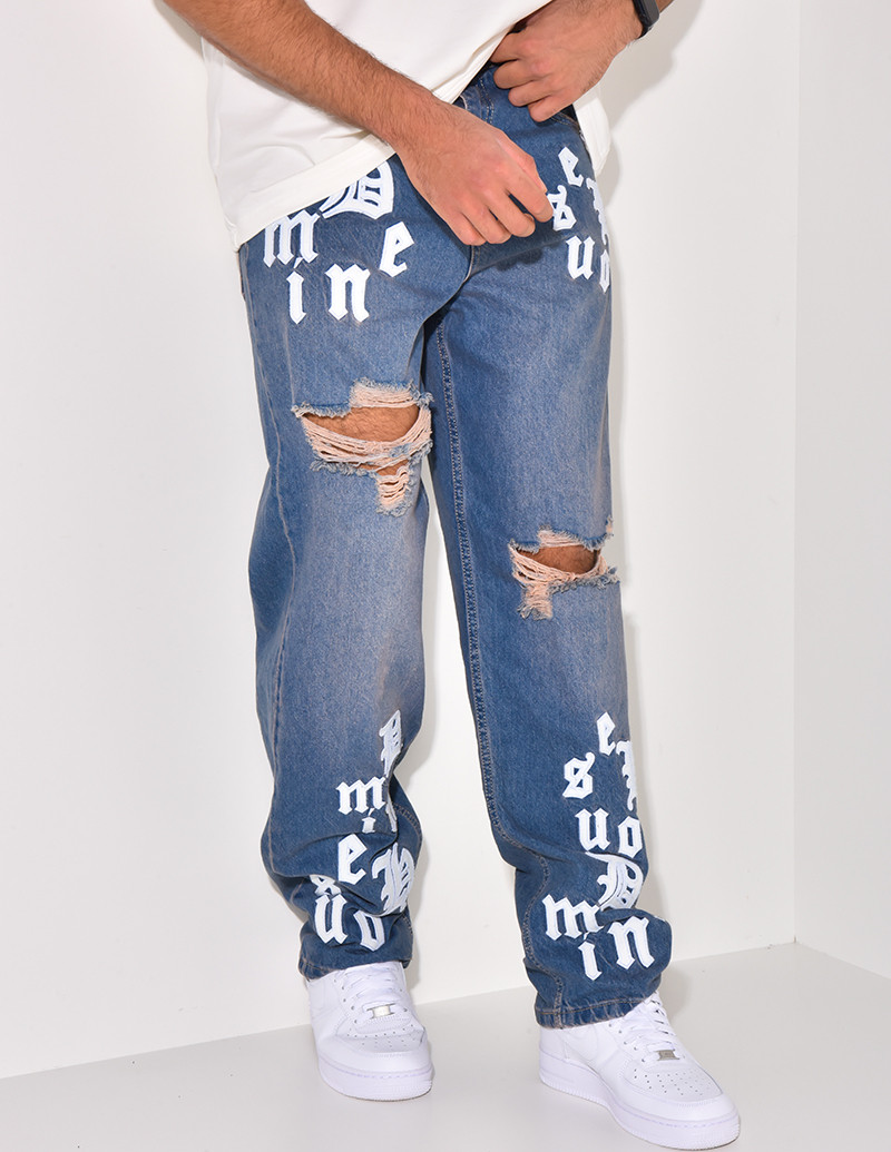 Jeans destroy à écritures
