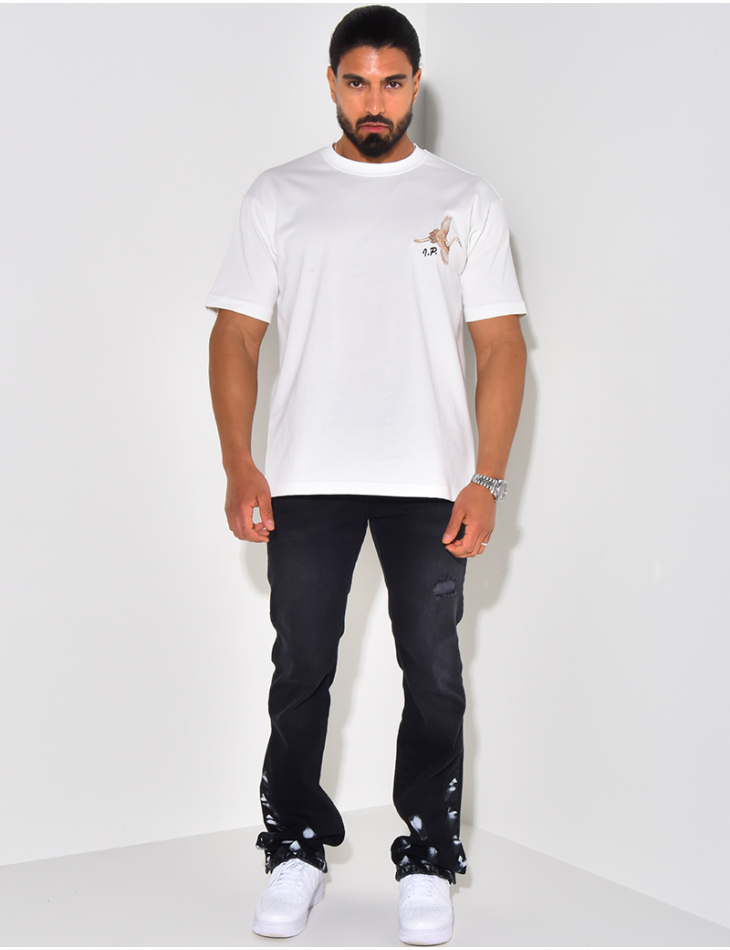 Jeans destroy à tâches de peinture Jeans destroy à tâches de peinture