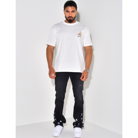 Jeans destroy à tâches de peinture Jeans destroy à tâches de peinture