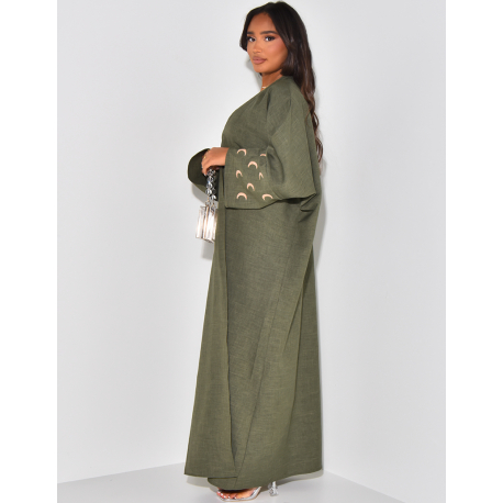 Kimono in Leinenoptik mit gestickten Mondmotiven auf den Ärmeln. Kimono in Leinenoptik mit gestickten Mondmotiven auf den Ärmeln.